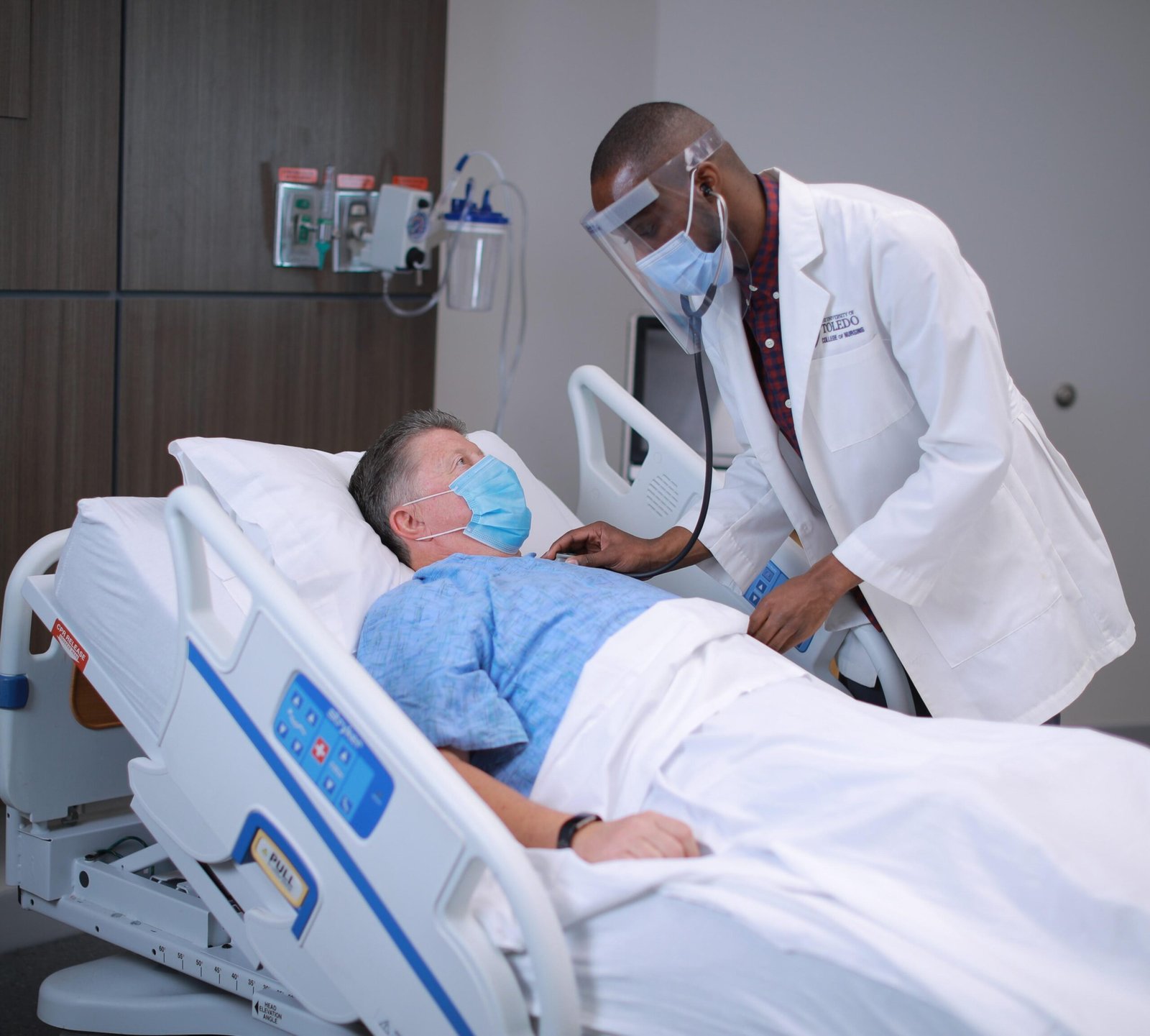 A medical professional doctor with a patient